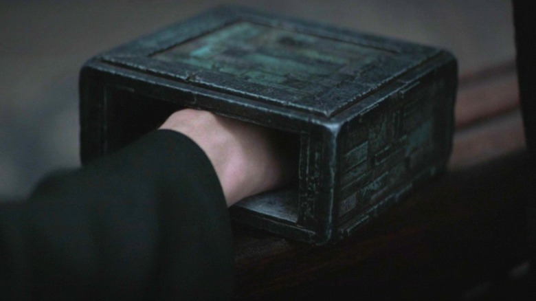 Paul's hand in a box