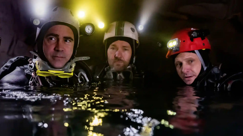 Cave divers in water in Thirteen Lives