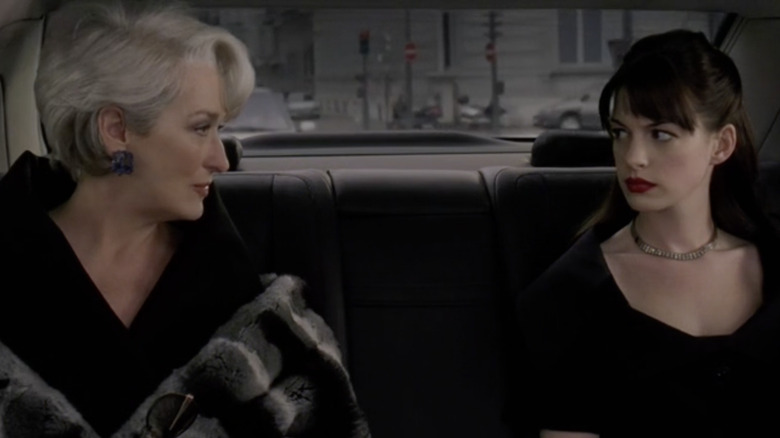 Meryl Streep and Anne Hathaway staring at each other