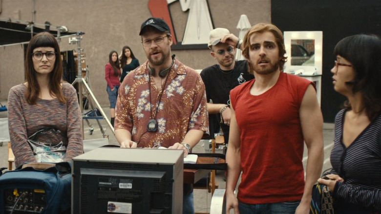 Seth Rogen and Dave Franco standing on set