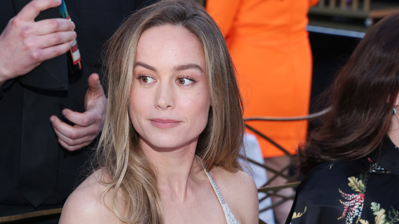 Brie Larson looking sideways in crowd