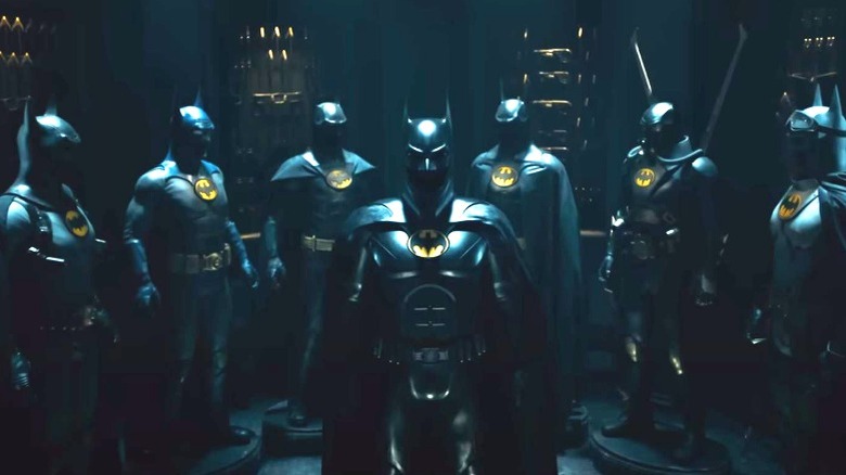 Seven different Batman suits 