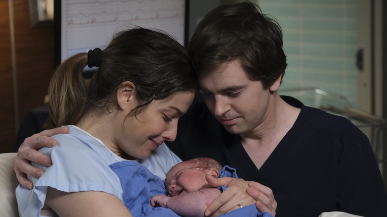 Shaun and Lea hold their baby