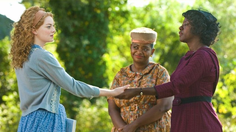 Emma Stone, Octavia Spencer, and Viola David in The Help