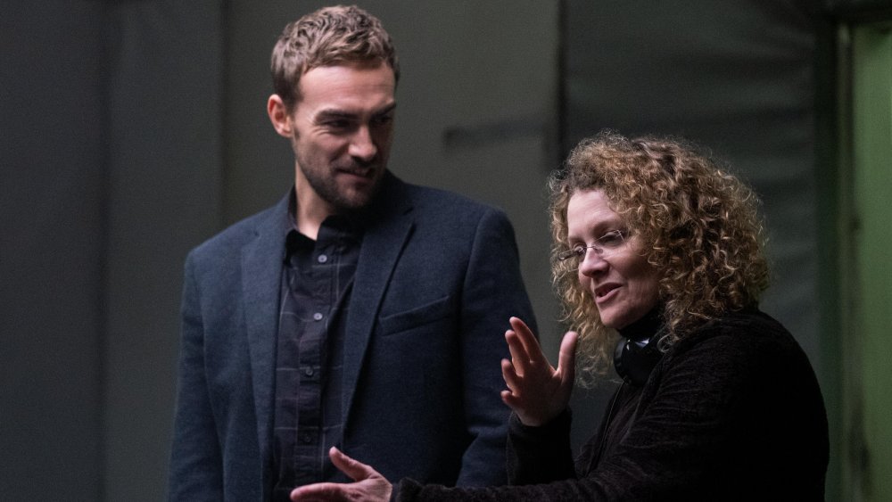 Tom Austen with director Daina Reid on the set of Helstrom 