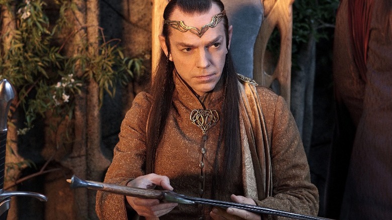 Elrond holding a sword