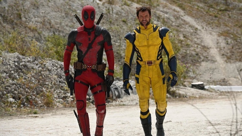 Deadpool and Wolverine walking in costume