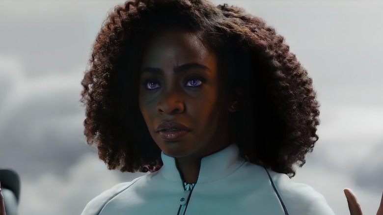 Monica Rambeau hands up