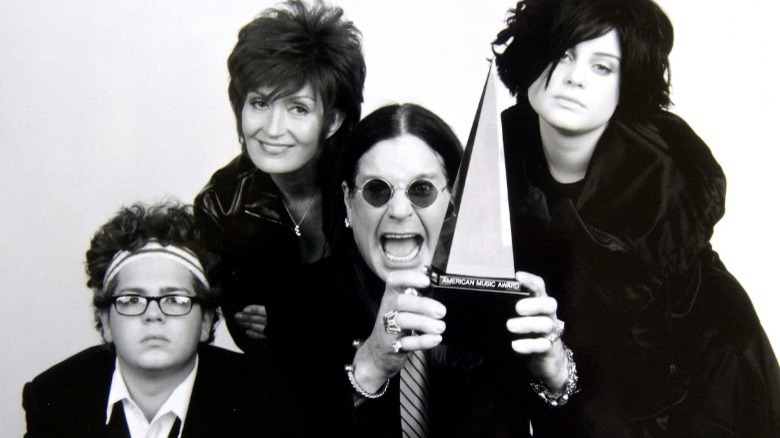 Osbournes pose with award