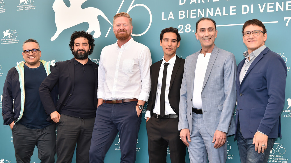 Producers Joe Russo, Mohamed Al Daradji, director Matthew Michael Carnahan, Adam Bessa, Suhail Dabbach and producer Anthony Russo attend Mosul photo call during the 76th Venice Film Festival