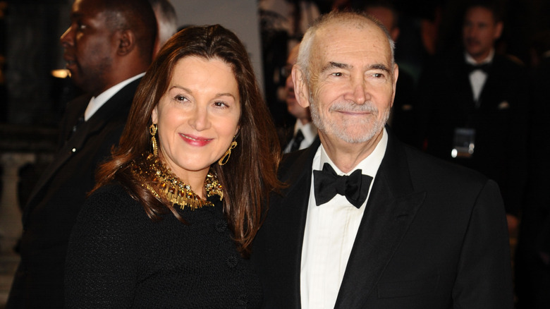 James Bond producers Barbara Broccoli and Michael Wilson smiling at event