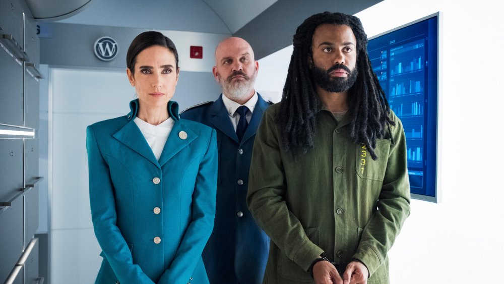 Daveed Diggs as Layton Wells, Jennifer Connelly as Melanie Cavill, and Mike O'Malley as Roche on TNT's Snowpiercer TV series