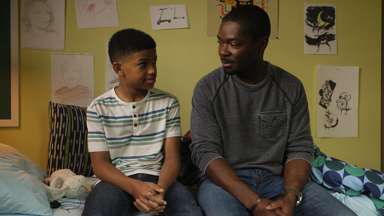 David Oyelowo and Lonnie Chavis sitting in a bed in The Water Man