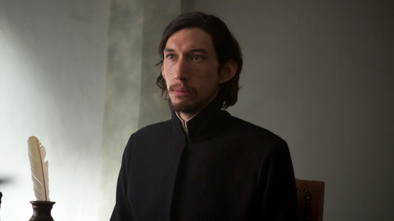 Adam Driver dressed as a priest 