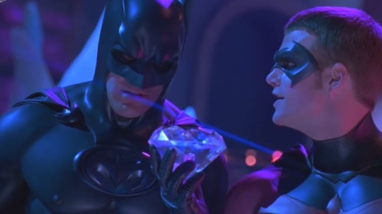 Batman and Robin staring at a giant diamond