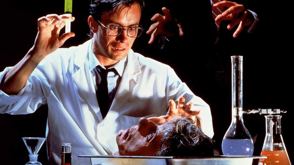 Jeffrey Combs in promotional art from Re-Animator