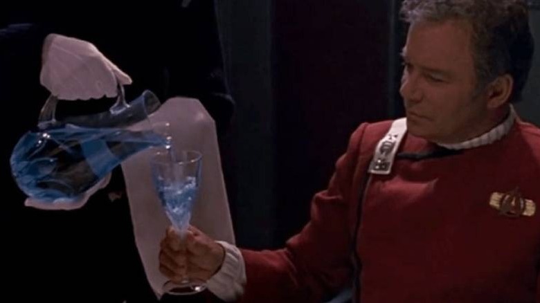 Captain Kirk receiving Romulan ale