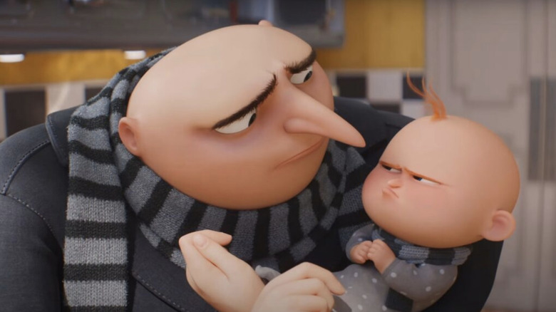 Gru holds his infant son in Despicable Me 4.