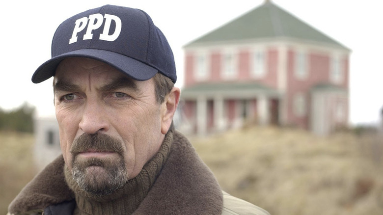 Jesse Stone looks intently