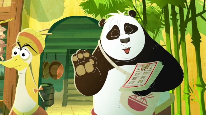 Po carrying menus in Kung Fu Panda: Secrets of the Scroll