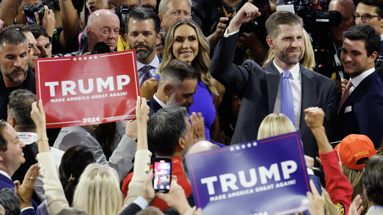 Crowd holding Donald Trump signs