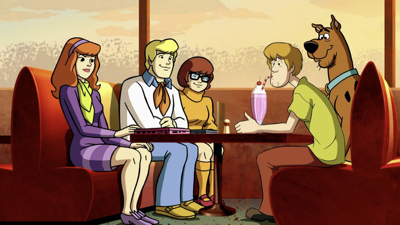 Shaggy enjoys a milkshake with the Mystery Inc. gang at a malt shop in Scooby-Doo! Frankencreepy (2014)