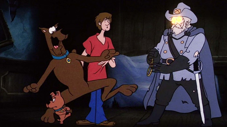 Scooby-Doo, Shaggy, and Scrappy are frightened by an old Confederate ghost in Scooby-Doo Meets the Boo Brothers (1987)