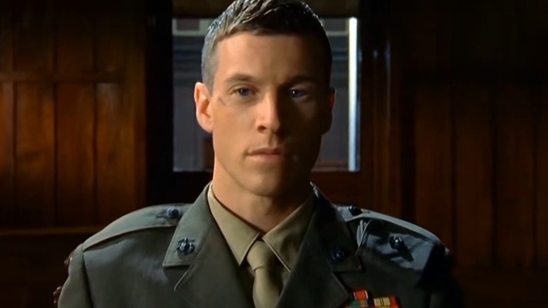 Brandon Beckett wearing military uniform