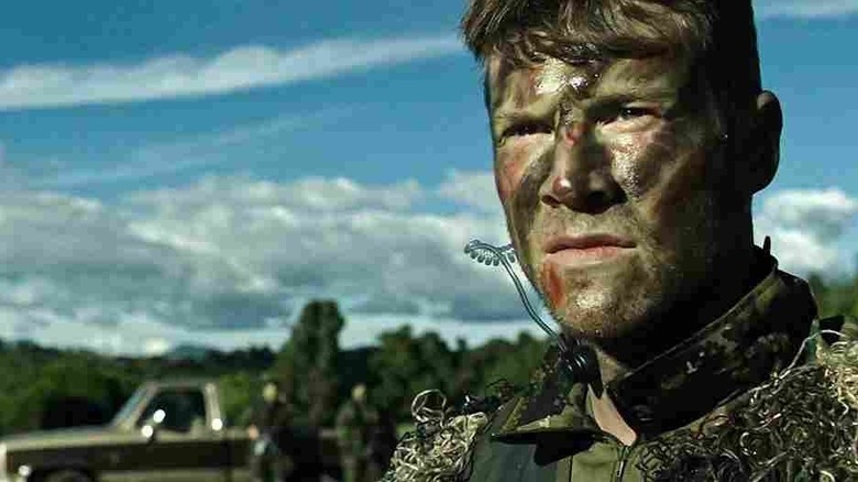 Brandon Beckett with camo facepaint