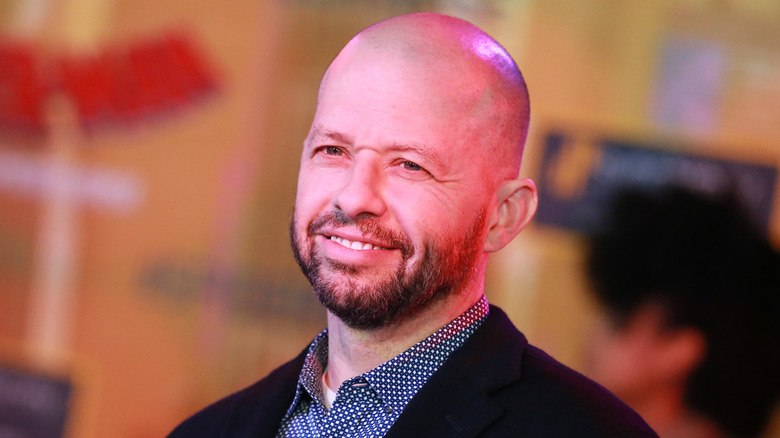 Jon Cryer smiles at event