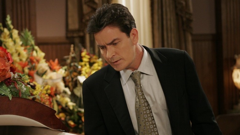 Charlie Harper at a funeral