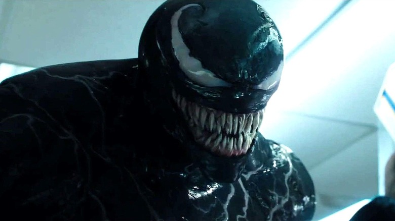 Venom cracks an evil grin