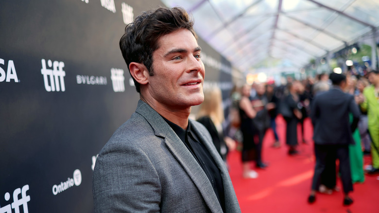 Zac Efron smiling at TIFF