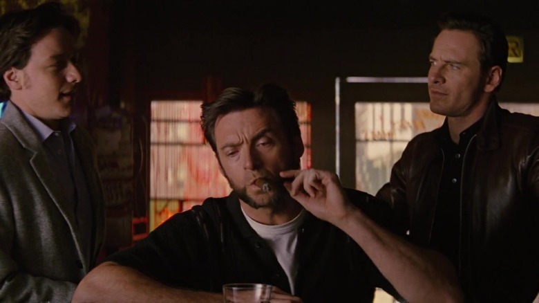 Wolverine smoking at a bar