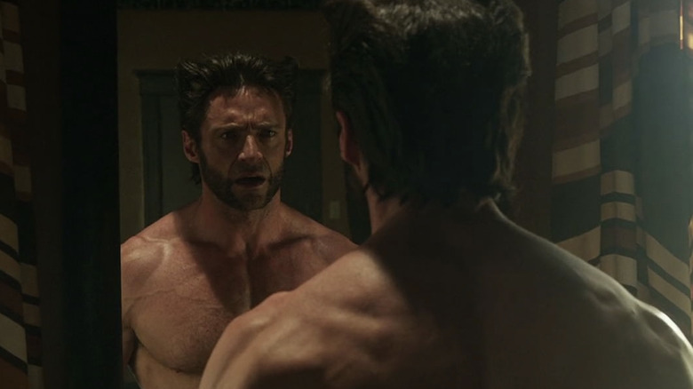 The Wolverine shirtless in the mirror