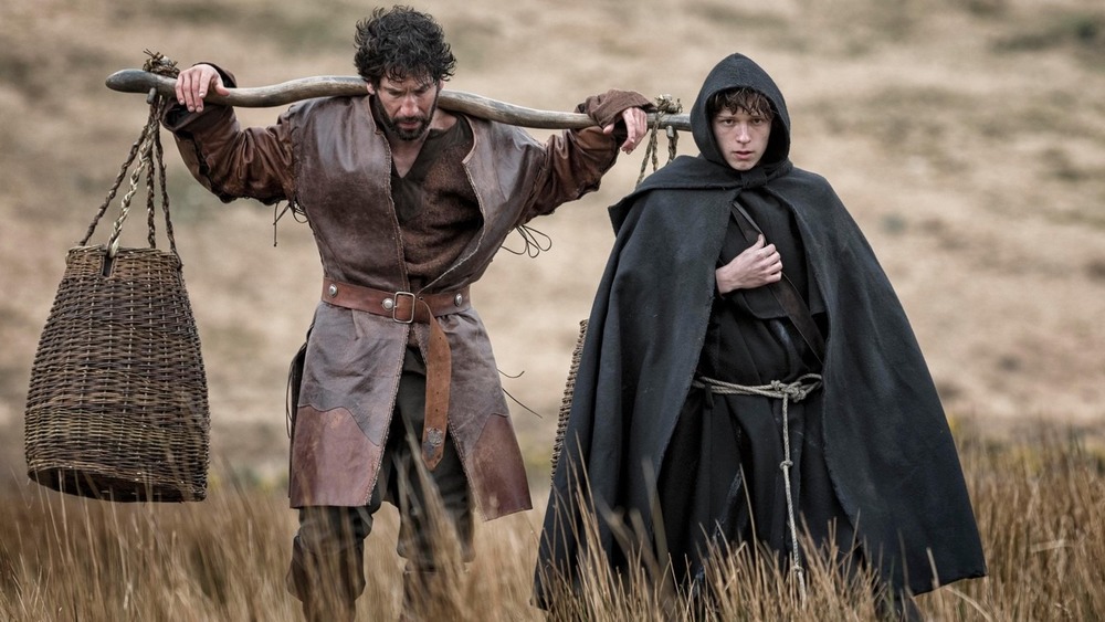 jon Bernthal as The mute carrying buckets in Pilgrimage