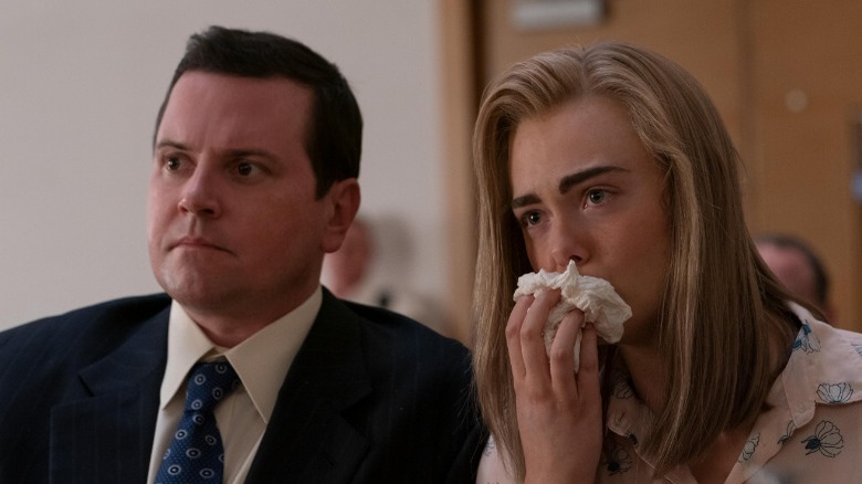 Elle Fanning as Michelle Carter crying in courtroom next to her attorney