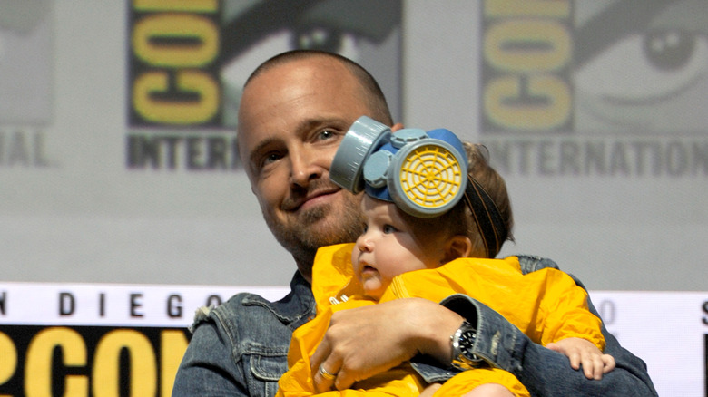 Aaron Paul and baby at comicon