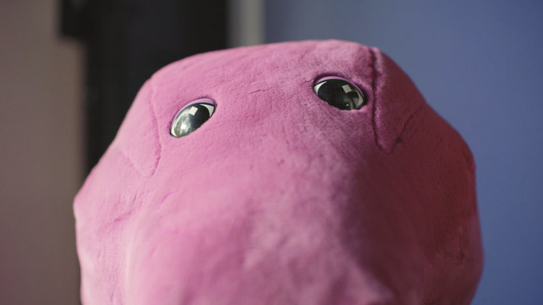 Close-up on top half of Barney's face