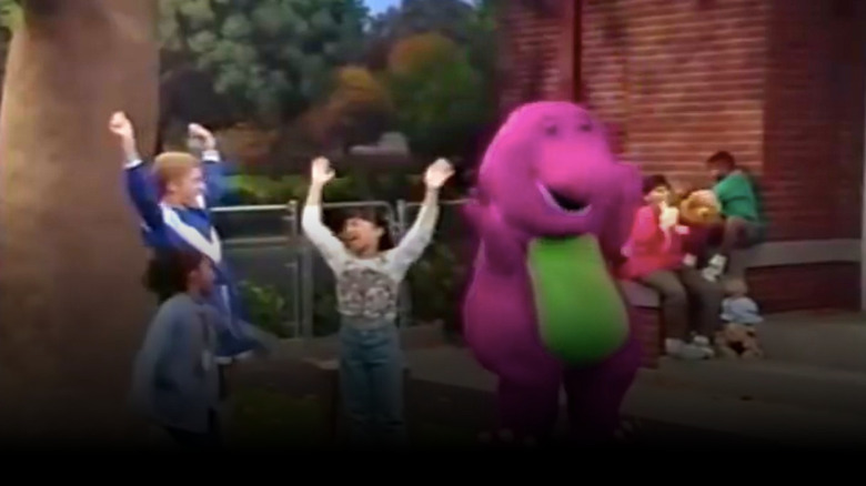 Barney and kids celebrating