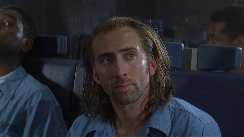 Nicolas Cage wearing his seatbelt