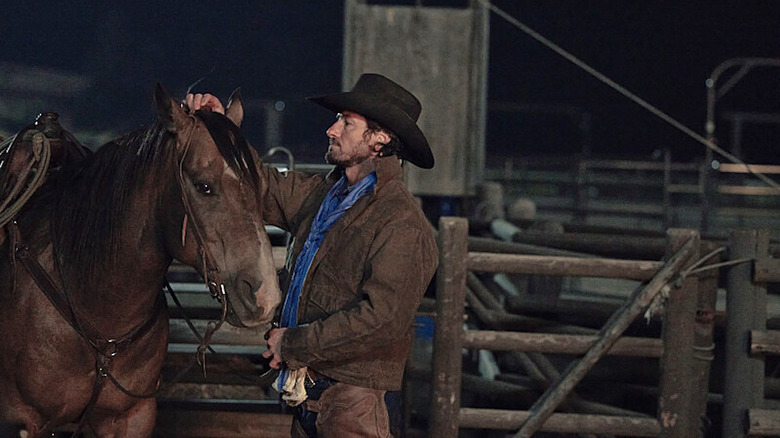 Ryan tending horse in Yellowstone