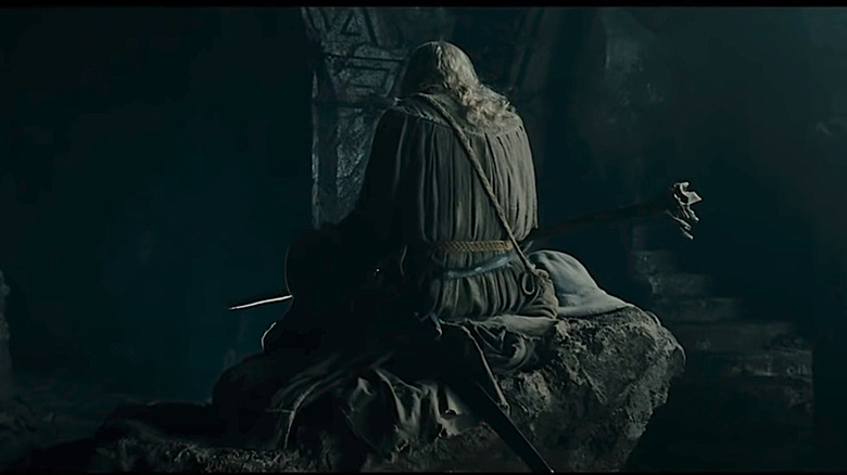 Gandalf sitting on rock