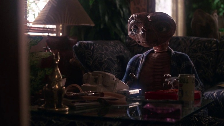 E.T. sitting at table