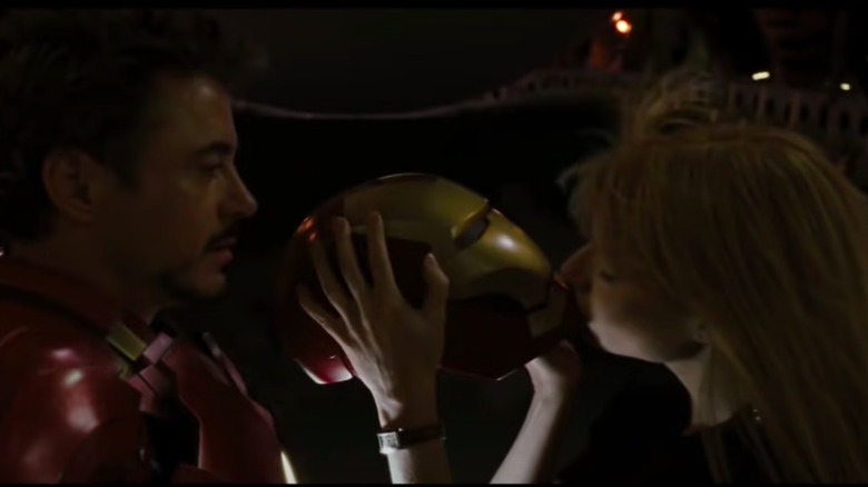 Pepper kissing Tony's helmet 