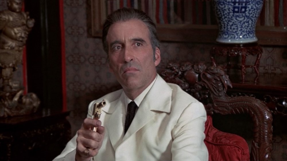 Christopher Lee as Francisco Scaramanga takes aim in The Man with the Golden Gun