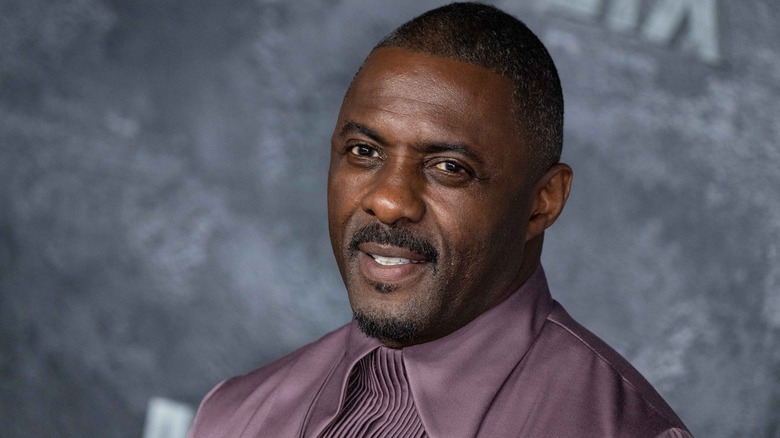 Idris Elba smiles