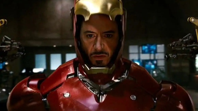 Tony Stark suiting up as Iron Man