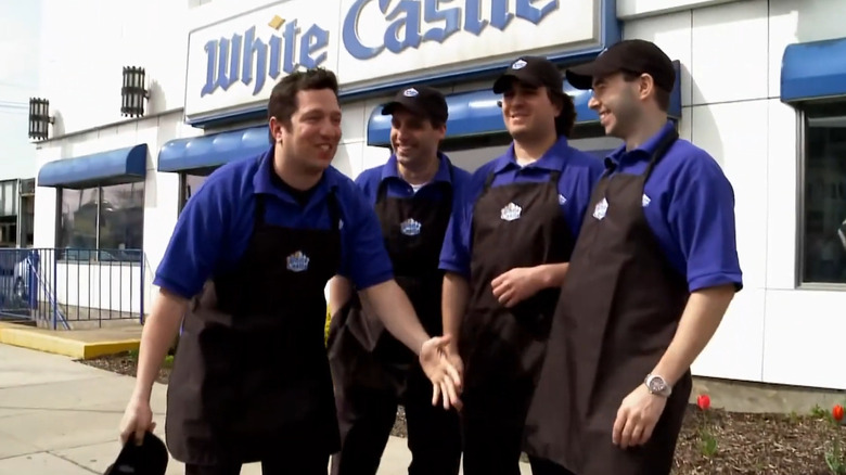 James Murray, Sal Vulcano, Joe Gatto, and Brian Quinn smiling