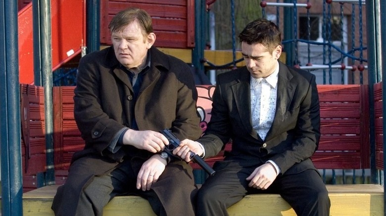 Colin Farrell and Brendan Gleeson in a kid's park